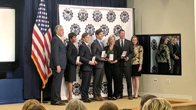 Deputy Secretary Eric Hargan presenting Gears of Government Awards to HHS employees