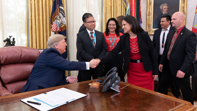 Commissioner of the Administration for Native Americans Jeannie Hovland shakes hands with President Donald J. Trump after the signing of an Executive Order Establishing the Task Force on Missing and Murdered American Indians and Alaska Natives