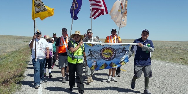 American Indians left their western tribal communities on foot to gather at the Four Corners Monument in an effort to raise awareness of health disparities. Photo Credit: Courtesy of the Indian Health Service (IHS).