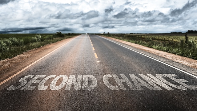 Second Chance written on an open road