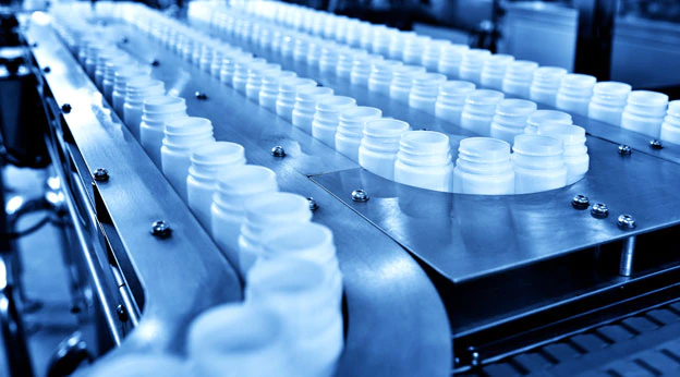 COVID-19 vaccine vials being manufactured and prepared for shipment.