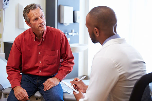 A patient and doctor discussing treatment options.