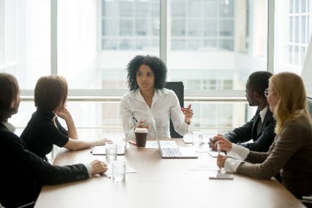 Staff discussing in a meeting