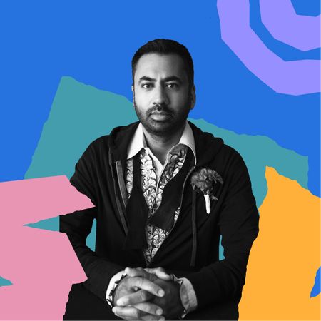 Headshot of Kal Penn in front of abstract colorful shapes